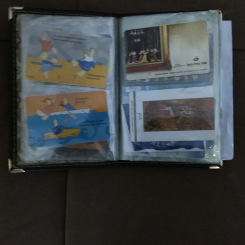 Collectible old phone cards with album used