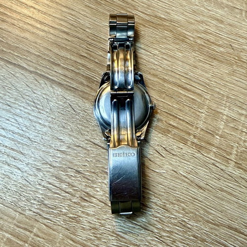 Seiko Vintage wristwatch used with original bracelet, white dial