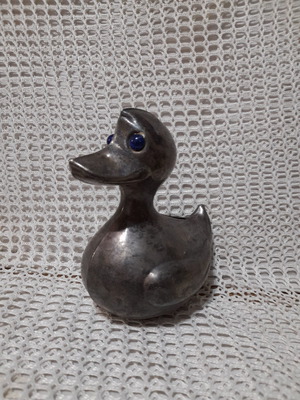 Vintage metal duck piggy bank used from the 60s