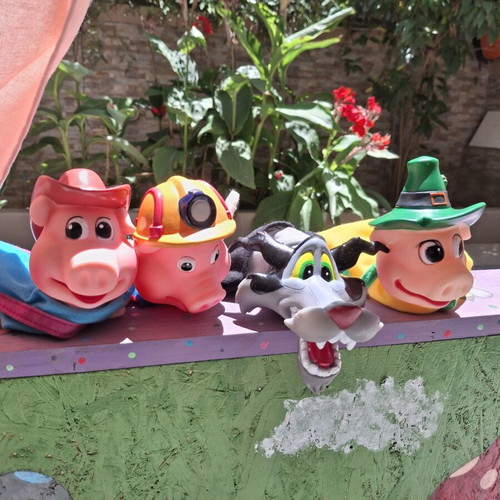 Handmade wooden puppet theater with hand-painted details and puppets like new