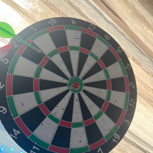 Target used with 2 darts, green and red