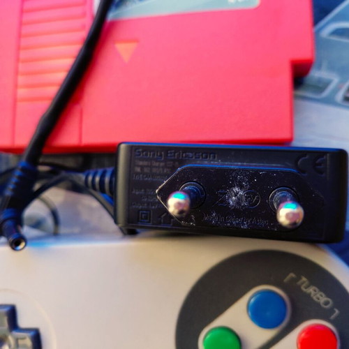 Retro game console used, complete with cartridge and controller