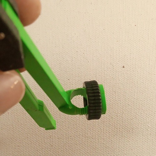 Plastic compass that holds pencil, pen etc, new