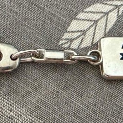 AGF KOSMOS vintage metal keychain