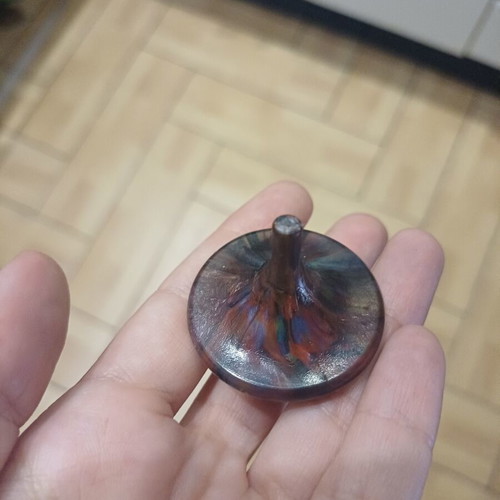 Spinning top made of recycled plastic caps, new