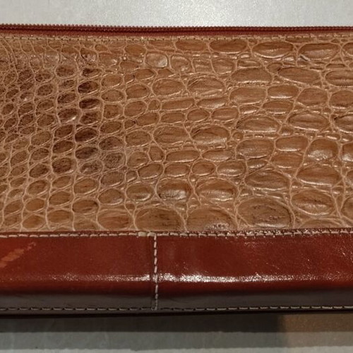 KEM leather handbag with crocodile pattern and tan details