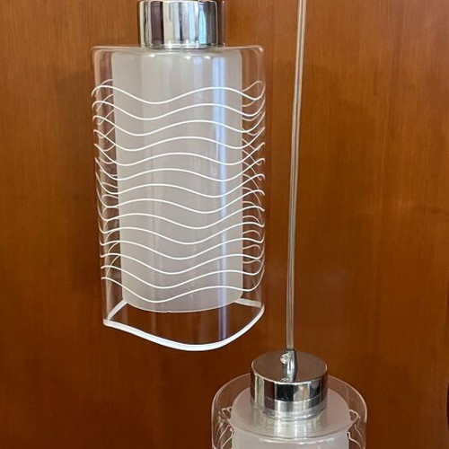 Pendant lamp with two glass shades used, adjustable height