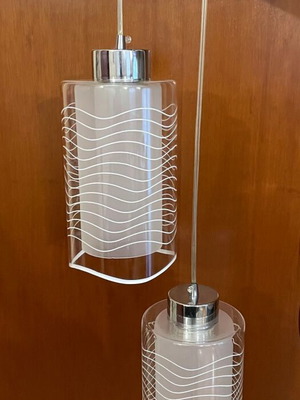 Pendant lamp with two glass shades used, adjustable height