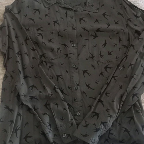 Shirt with swallows in khaki color like new