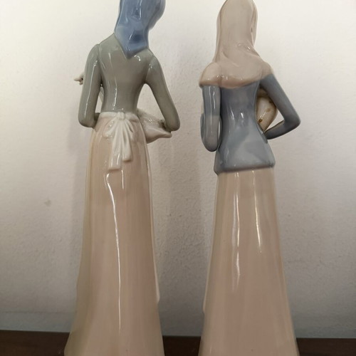 Porcelain female figurines like new, set of 2, 29 cm