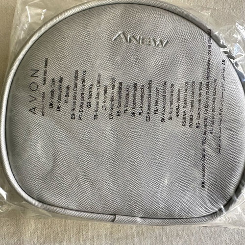 Avon toiletry bag new, silver