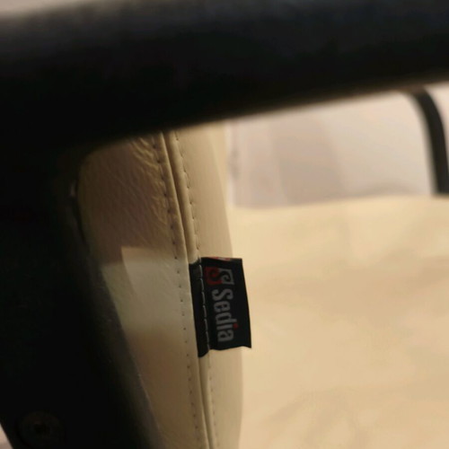 Office chair used with ergonomic position and height adjustment