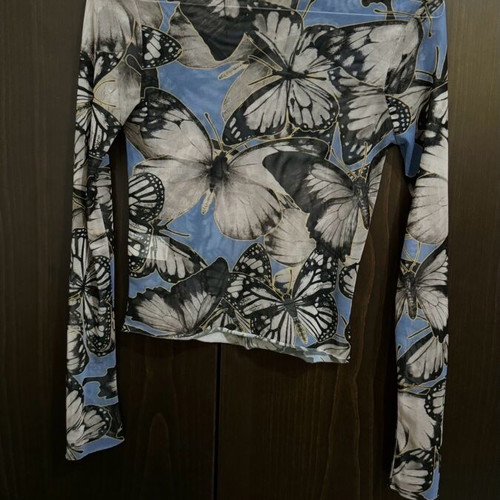 Milkwhite mesh top like new with butterfly print