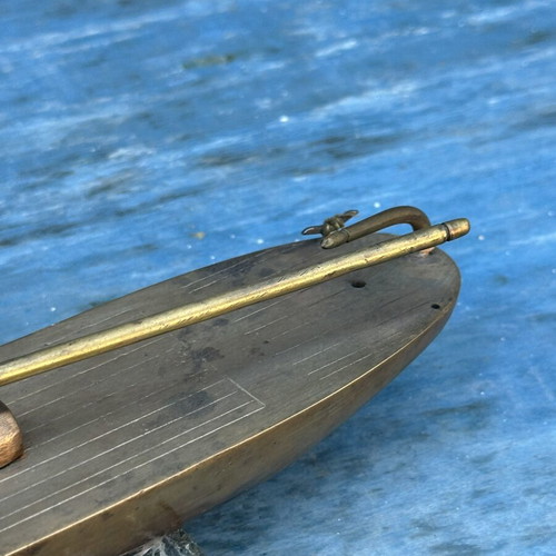 Vintage brass sailboat decoration on marble base, used