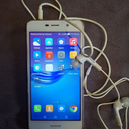 Huawei mobile phone used, white, with headphones and charger