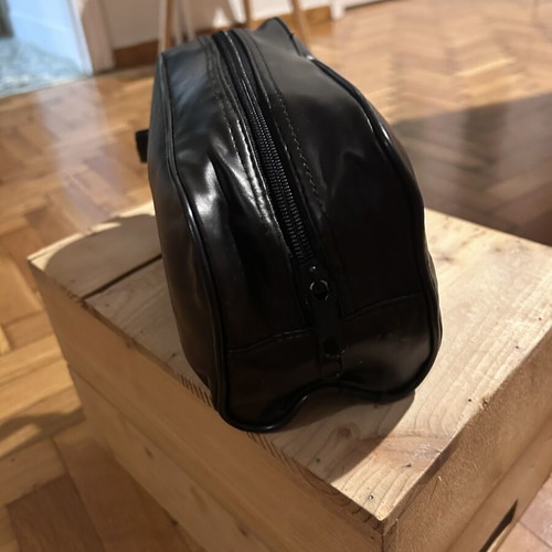 Two black leather toiletry bags, one Adidas