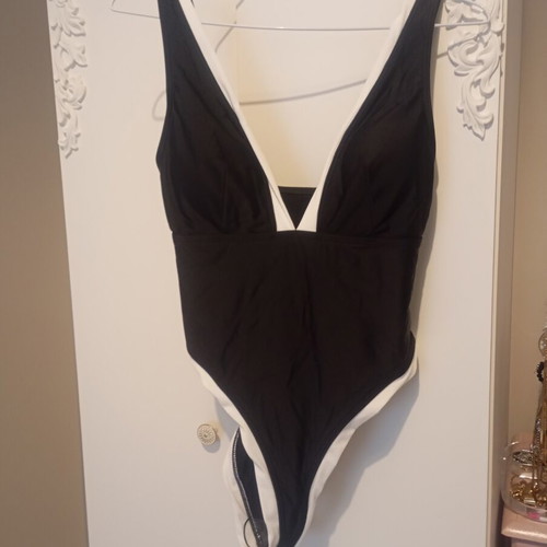 One-piece black and white swimsuit new in packaging, size S