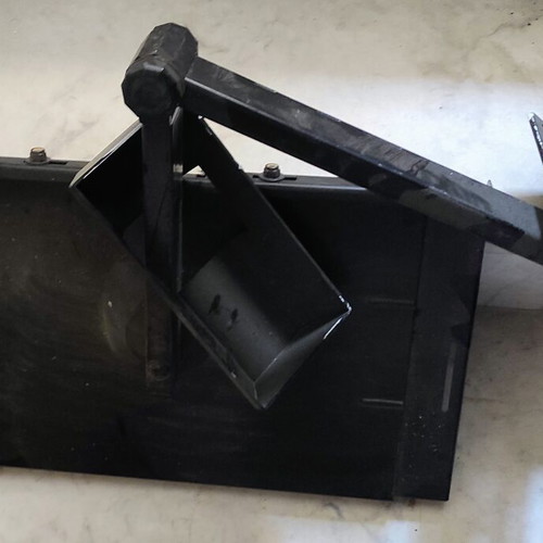 Metal base with arm used, can be used as shelf