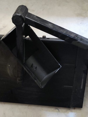 Metal base with arm used, can be used as shelf