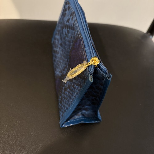 Estée Lauder blue toiletry bag like new with snake skin pattern