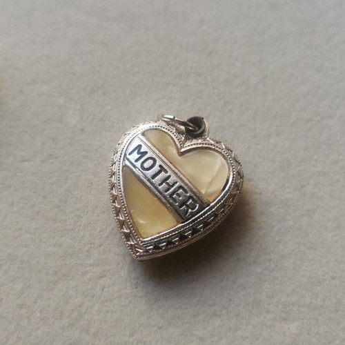 Mother of pearl brooch and heart-shaped pendant, 1950s