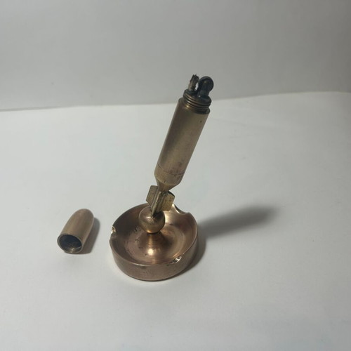 Bronze bullet-shaped ashtray lighter used