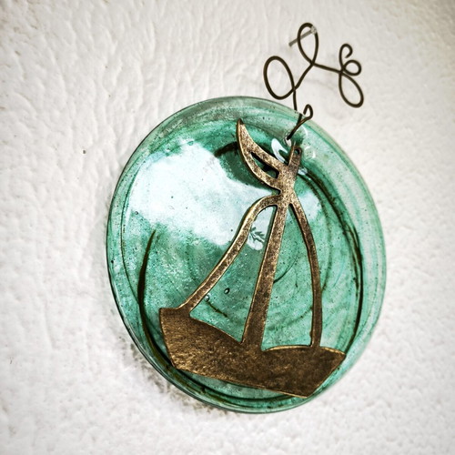 Glass and bronze wall decoration with sailboat