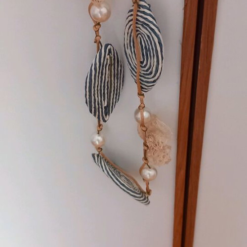 Women's necklace used handmade with pearls and cord