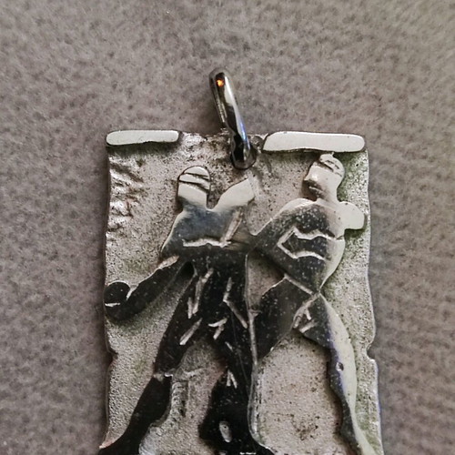 Silver pendant new 2.5 cm by 0.2 cm