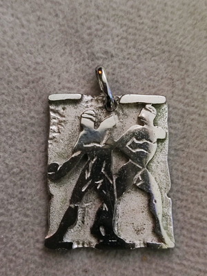 Silver pendant new 2.5 cm by 0.2 cm