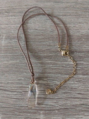 Swarovski necklace like new with crystal pendant and brown cord