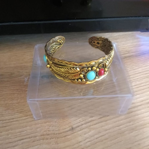Ethnic bracelet like new, gold color with stones