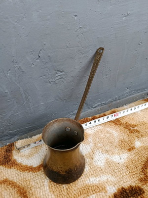 Old cezve handmade with engraved handle, used