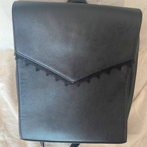 Black ladies handbag backpack like new with lace design and laptop pocket