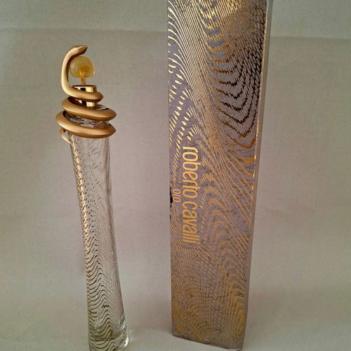 Roberto Cavalli Oro and Christian Dior J'adore empty perfume bottles