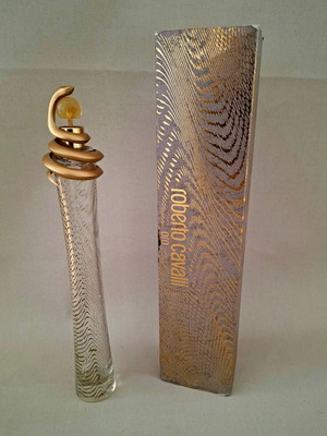 Roberto Cavalli Oro and Christian Dior J'adore empty perfume bottles