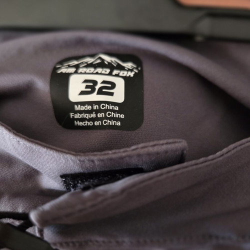 AM Road Fox cycling pants, black and grey stretch fabric