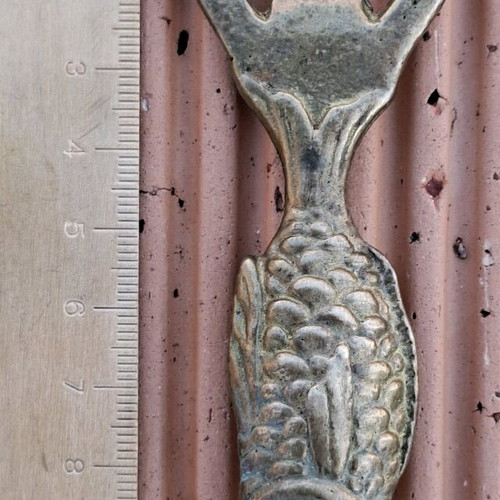 Vintage brass fish-shaped bottle opener used