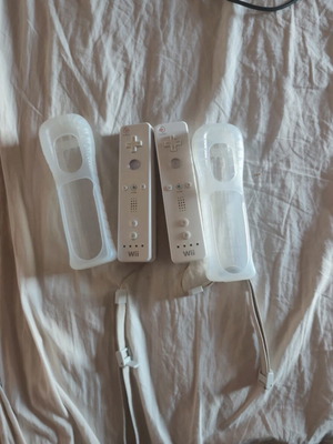 Nintendo Wii χειριστήρια motion πακέτο 2 με θήκες σιλικόνης σαν καινούργια