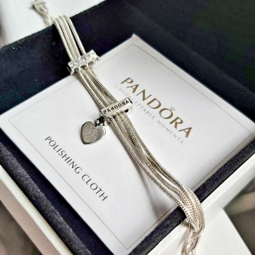 Pandora s925Ale Reflexions bracelet with four strands.