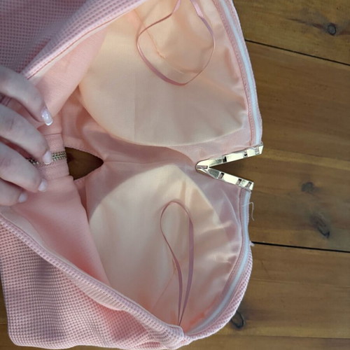 Pink bustier with gold detail and zipper, size small