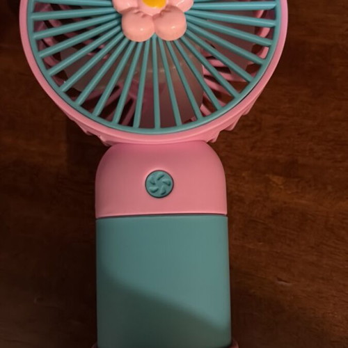 Handheld fan with base and charging cable, rechargeable