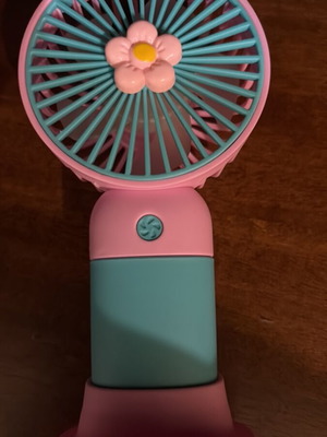 Handheld fan with base and charging cable, rechargeable