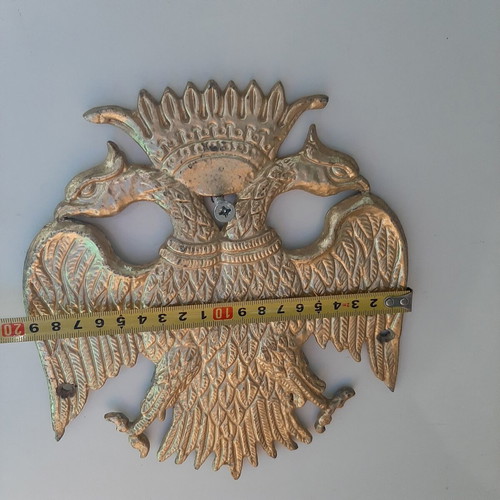 Metallic double-headed eagle coat of arms like new from old church