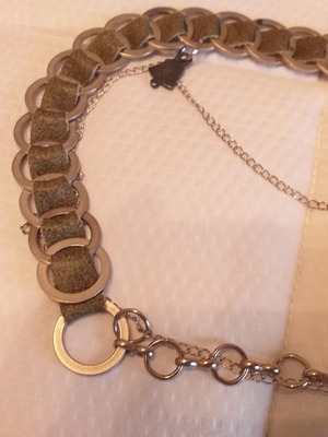 Metal belt with oil leather and chains