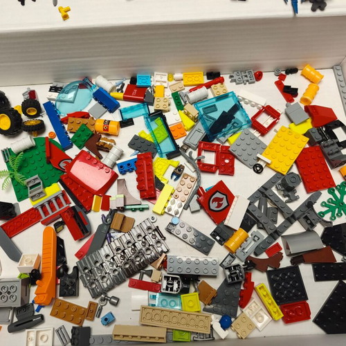 Lego lot like new with figures, weapons, and bricks
