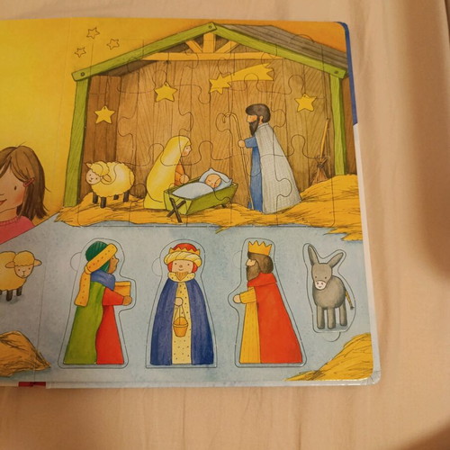 Christmas book with 15-piece puzzle and figures used