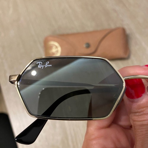 Ray Ban sunglasses like new, gold with unique shape