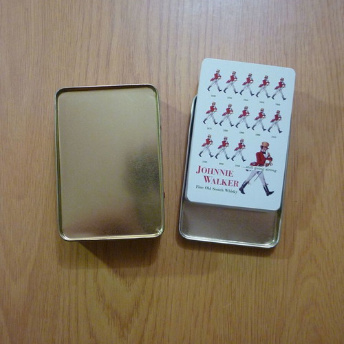 Johnnie Walker collectible playing cards like new in metal tin