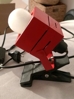 Vintage projector used with clip and red cable